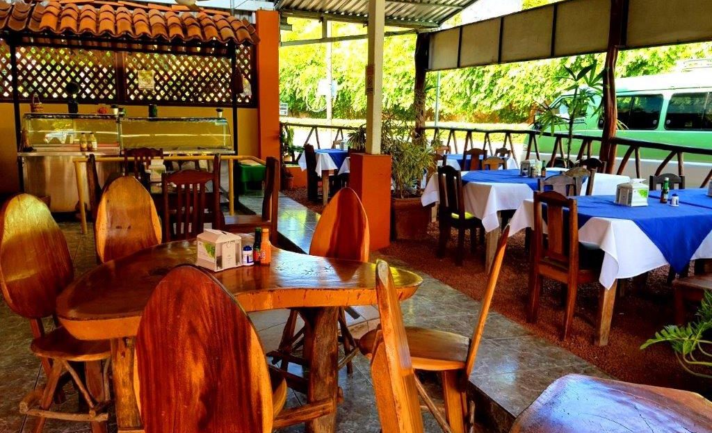 Herradura income property with a restaurant and minimarket near Los Sueños and the beach. Solid construction, great location, and room to grow.