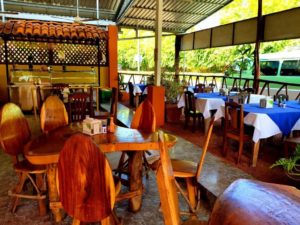Herradura income property with a restaurant and minimarket near Los Sueños and the beach. Solid construction, great location, and room to grow.