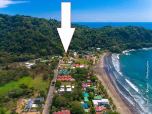 Jaco Beach land ready to build steps from beach. Large 2,442 m² lot with commercial or residential potential in a prime south-end location.