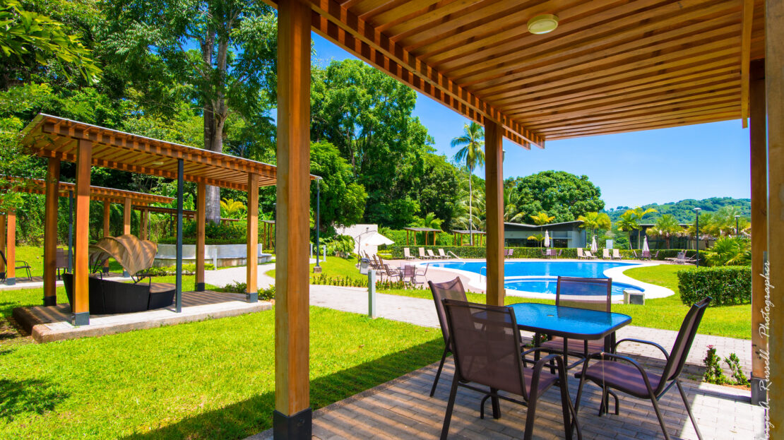 Herradura gated corner lot with 251 m² inside a secure community near Los Sueños, Jaco, and the beach. Ready for your custom home.