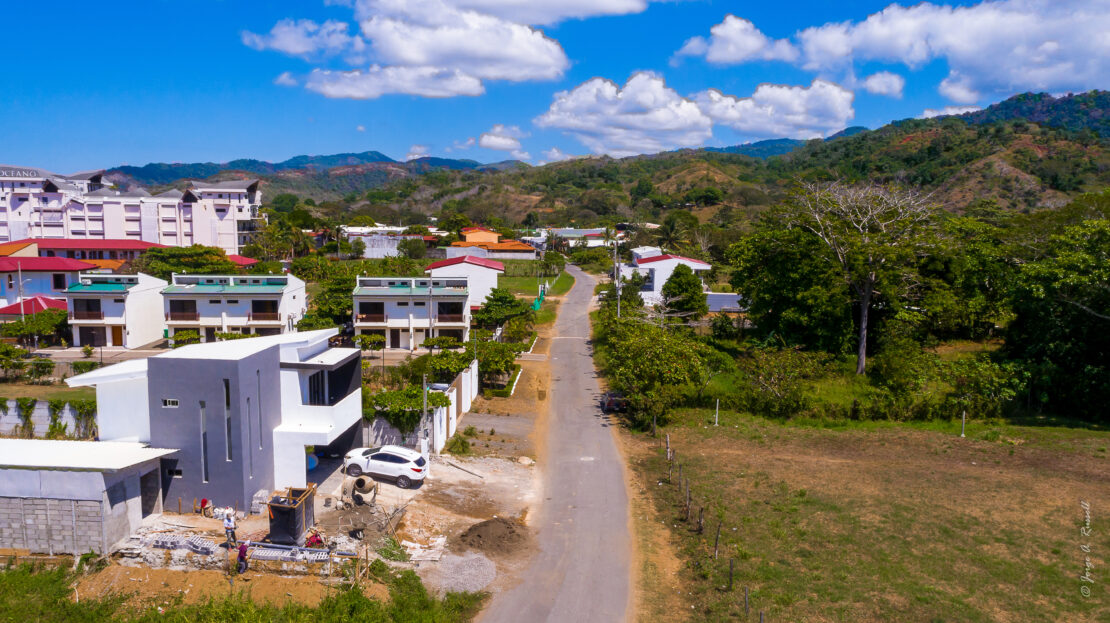 Jaco Beach residential commercial lot steps from downtown, offering mix potential with utilities in place and prime walkable positioning.