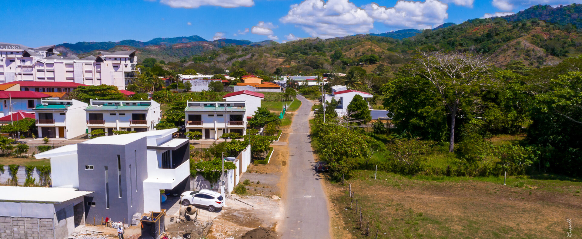 Jaco Beach residential commercial lot steps from downtown, offering mix potential with utilities in place and prime walkable positioning.
