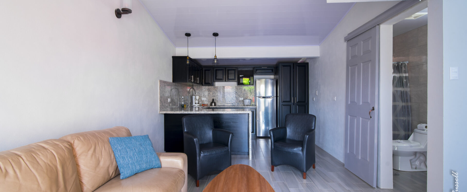 Jaco Beach one bedroom condo near the sand and main street, newly renovated with modern finishes and great walkability in a secure community.