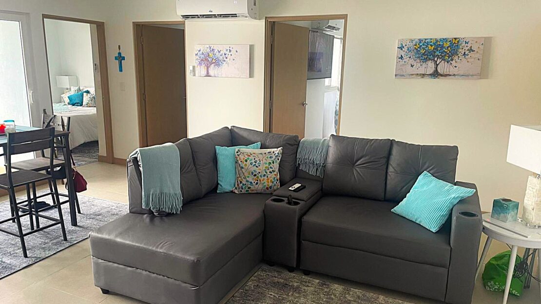 Jaco downtown condo one block from the beach, fully furnished with great amenities, pools, gym, and walkable access to shops, dining, and entertainment.