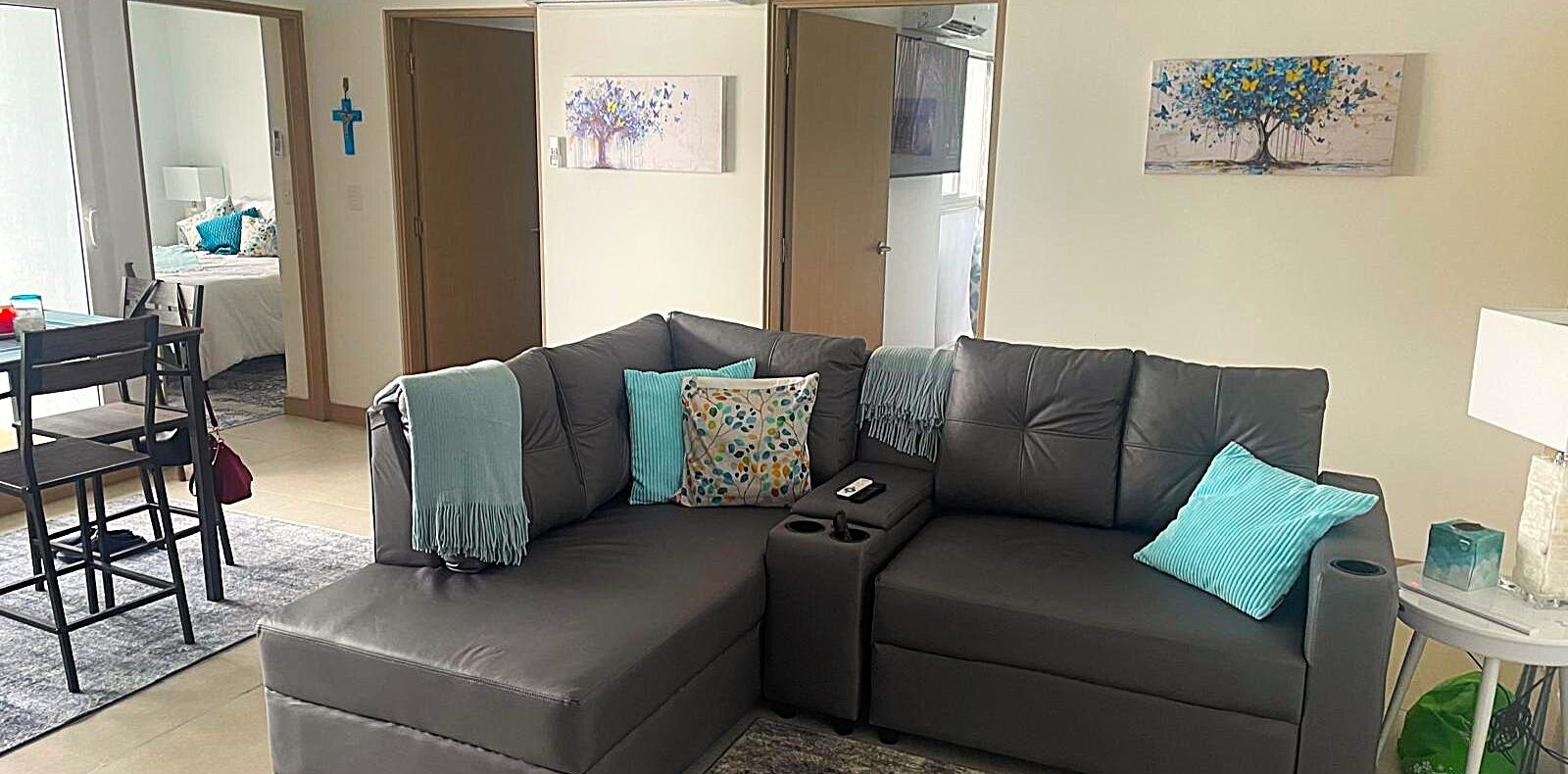 Jaco downtown condo one block from the beach, fully furnished with great amenities, pools, gym, and walkable access to shops, dining, and entertainment.