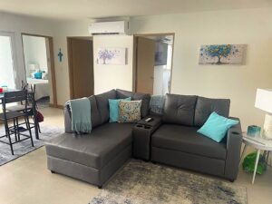 Jaco downtown condo one block from the beach, fully furnished with great amenities, pools, gym, and walkable access to shops, dining, and entertainment.