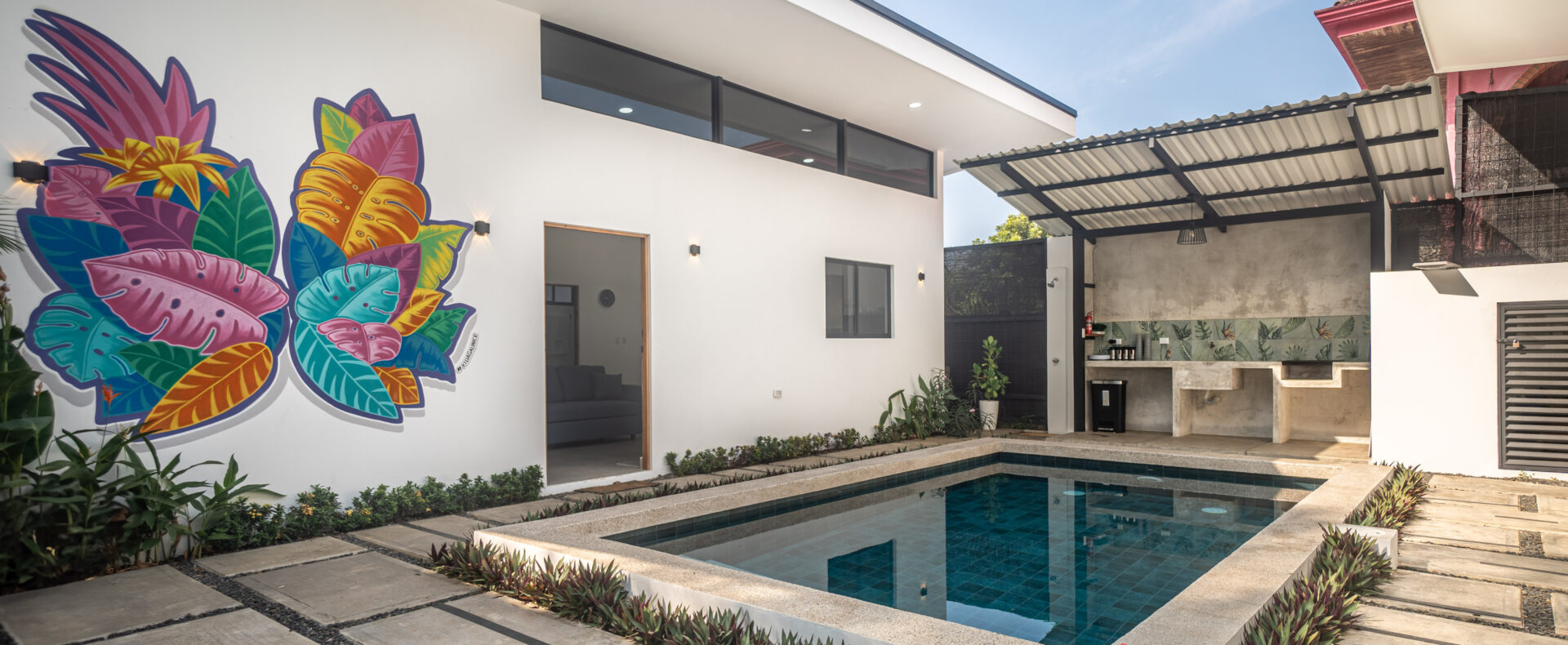 Herradura beachside dual-home property for sale. Turnkey furnished homes near Marina Los Sueños with private pool, parking, and no HOA fees.
