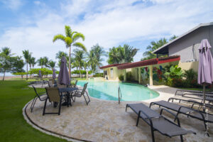 Jaco Beach condo 3-bedroom in Tres Regalos. Beachfront 3-bedroom furnished with balconies, pool access, security, and walk-to-town.