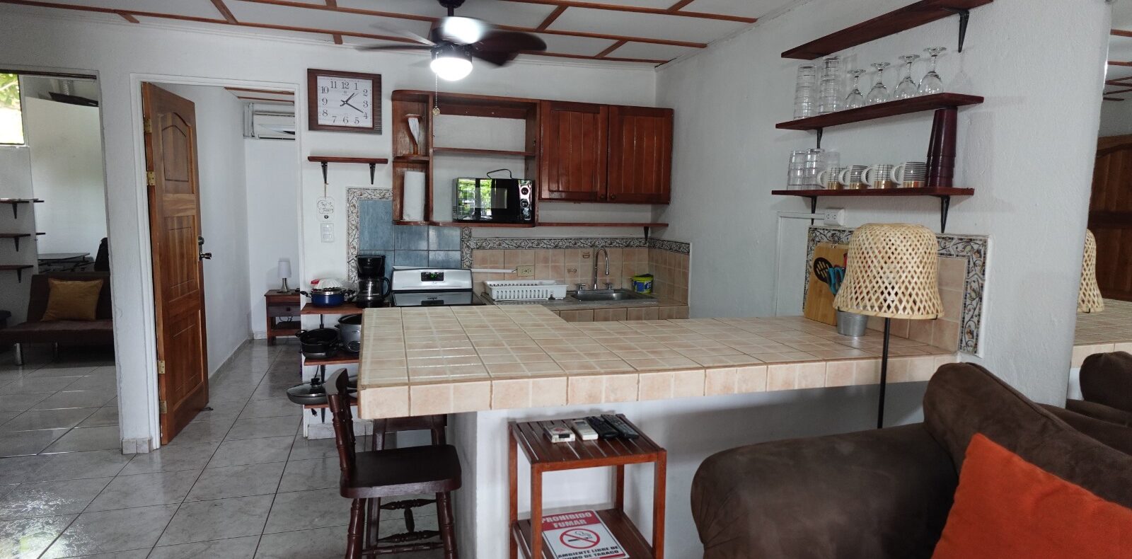 Jaco beachside retreat 3-bedrooms for sale. Furnished near the sand with pool, security, low fees, and a bright open layout in Jaco Sol.