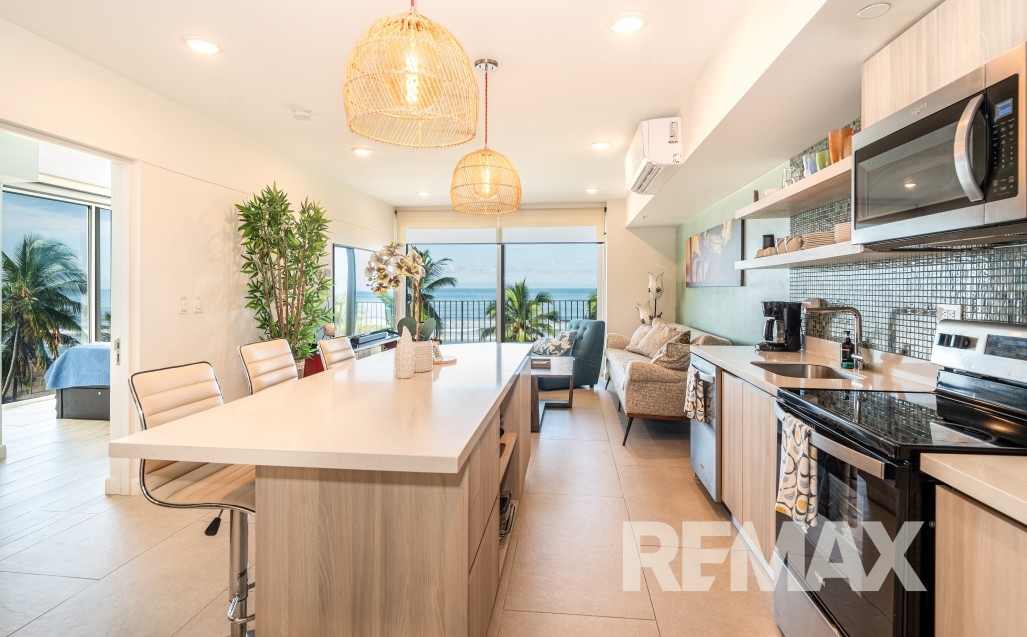 RE/MAX real estate, Costa Rica, Jaco, Pacific Point 402 | Direct Oceanfront Living with a Private Lock-Off Suite